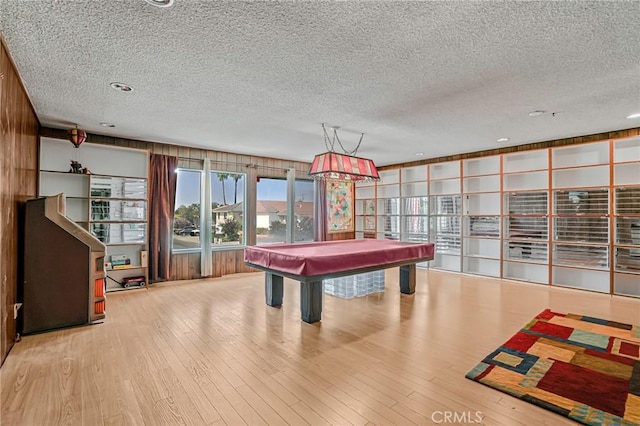 9522 Yellowstone Dr, Huntington Beach, CA 92646 - rec room with a textured ceiling, billiards, wood finished floors, and recessed lighting