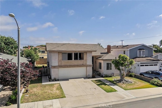 9522 Yellowstone Dr, Huntington Beach, CA 92646 - view of front facade featuring stucco siding, concrete driveway, a garage, and a shingled roof