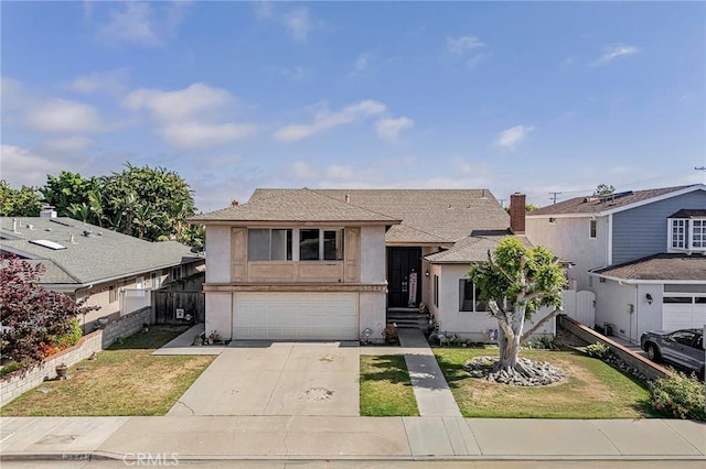 9522 Yellowstone Dr, Huntington Beach, CA 92646 - split level home with stucco siding, concrete driveway, a garage, and a shingled roof