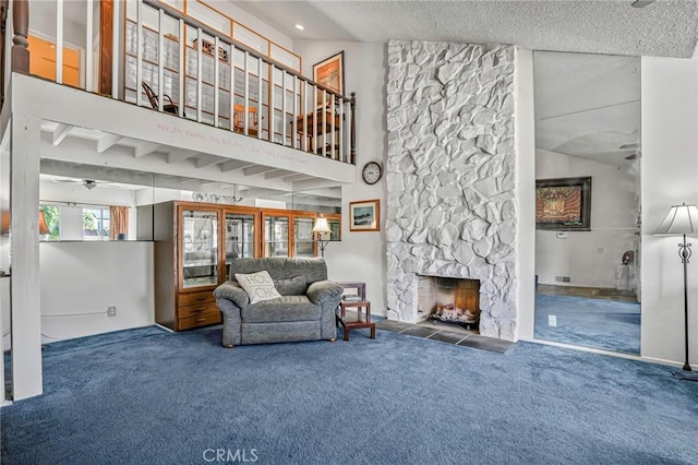 9522 Yellowstone Dr, Huntington Beach, CA 92646 - living room featuring carpet floors, ceiling fan, a textured ceiling, a fireplace, and lofted ceiling