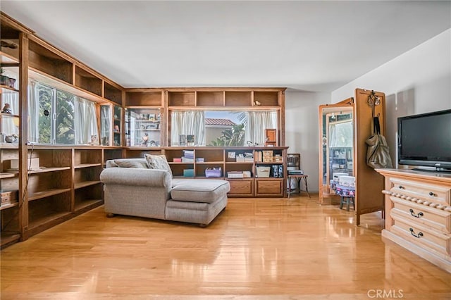 9522 Yellowstone Dr, Huntington Beach, CA 92646 - living area with light wood-type flooring and healthy amount of natural light