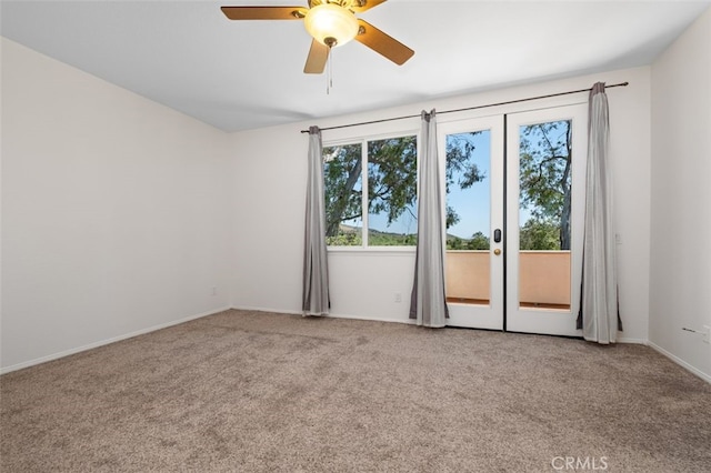 8542 E Heatherview Ln, Orange, CA 92869 - empty room with carpet floors, french doors, and ceiling fan