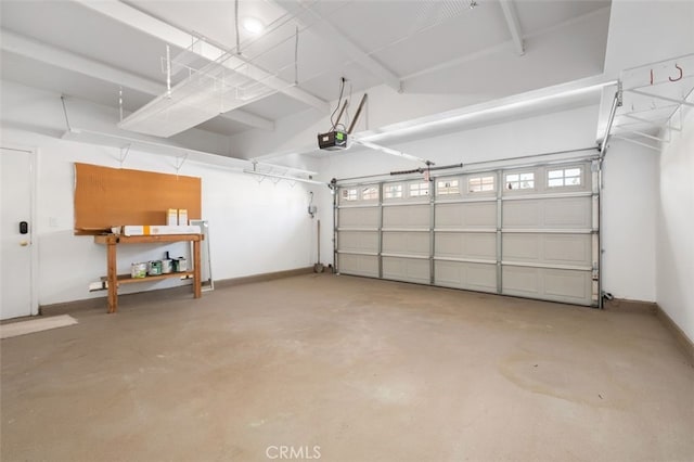 8542 E Heatherview Ln, Orange, CA 92869 - garage featuring a garage door opener and baseboards