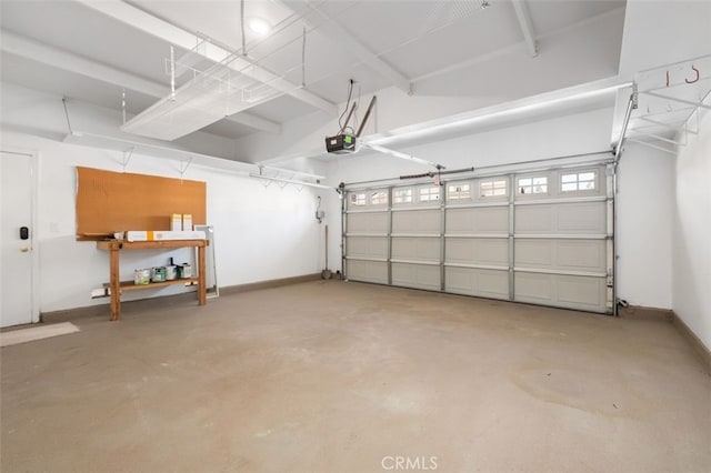 8542 E Heatherview Ln, Orange, CA 92869 - garage featuring a garage door opener and baseboards