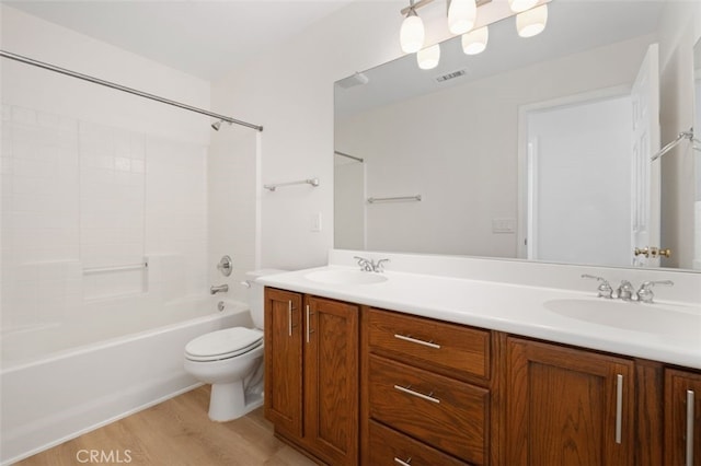 8542 E Heatherview Ln, Orange, CA 92869 - bathroom featuring double vanity, wood finished floors, and  shower combination