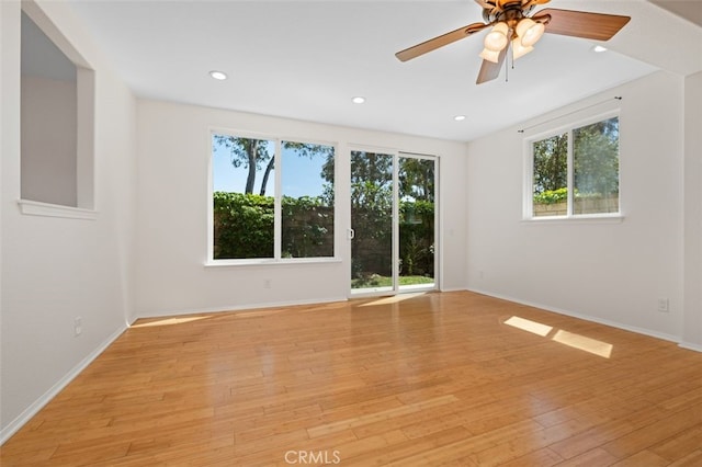 8542 E Heatherview Ln, Orange, CA 92869 - empty room with light wood-style flooring, a ceiling fan, baseboards, and recessed lighting