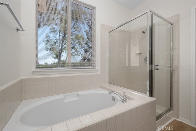 8542 E Heatherview Ln, Orange, CA 92869 - bathroom featuring a shower stall and a garden tub