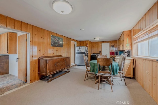 8288 White Rd, Phelan, CA 92371 - dining area with wood walls and light colored carpet