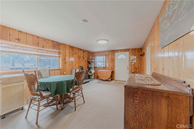 8288 White Rd, Phelan, CA 92371 - carpeted dining space featuring wood walls