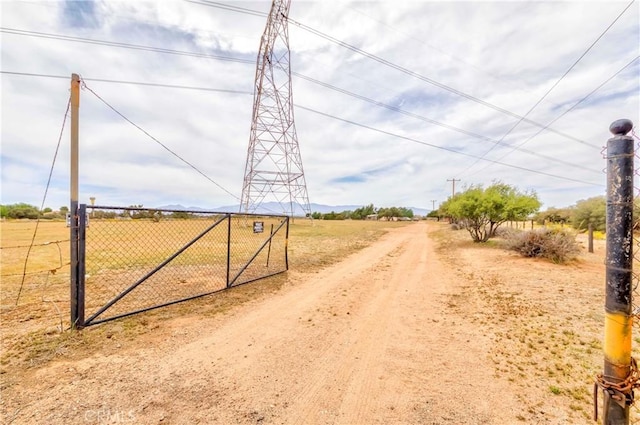 8288 White Rd, Phelan, CA 92371 - view of street featuring a view of rural / pastoral area, a gate, and a gated entry