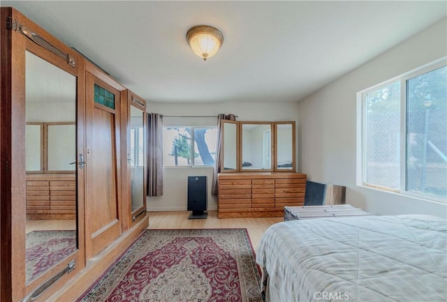 8288 White Rd, Phelan, CA 92371 - bedroom featuring light wood-style floors