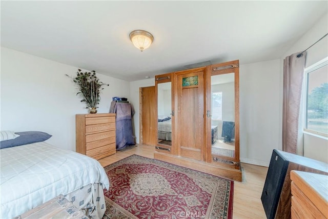 8288 White Rd, Phelan, CA 92371 - bedroom with light wood-type flooring