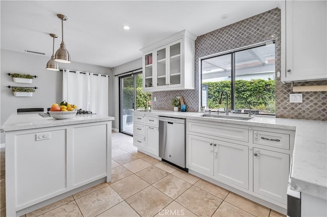 4017 Cottonwood Grove Trl, Calabasas, CA 91301 - kitchen featuring stainless steel dishwasher, a sink, white cabinetry, decorative backsplash, and recessed lighting