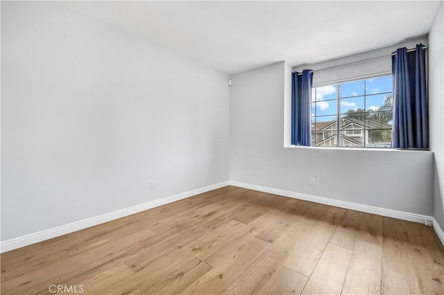 4017 Cottonwood Grove Trl, Calabasas, CA 91301 - empty room with baseboards and wood-type flooring