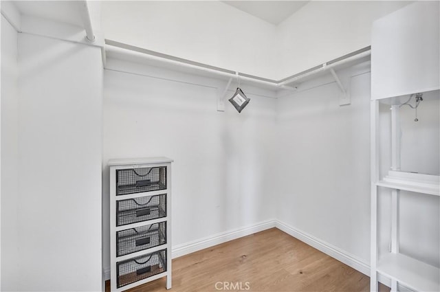 4017 Cottonwood Grove Trl, Calabasas, CA 91301 - walk in closet with wood finished floors