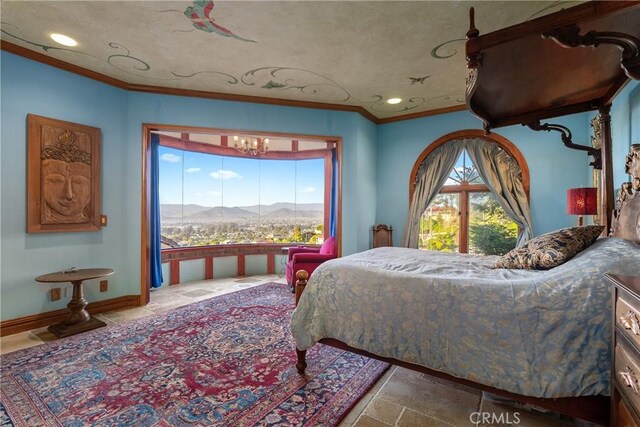 2743 Rodman Dr, Los Osos, CA 93402 - bedroom with a mountain view, ornamental molding, a chandelier, recessed lighting, and baseboards