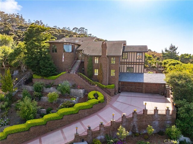 2743 Rodman Dr, Los Osos, CA 93402 - rear view of property featuring stairs, fence, and stucco siding