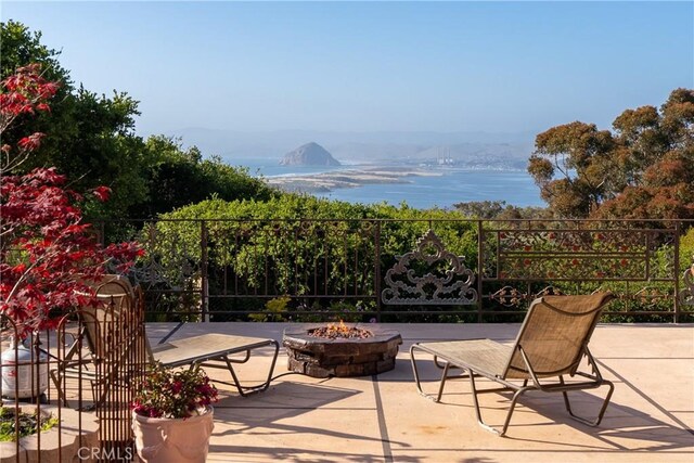 2743 Rodman Dr, Los Osos, CA 93402 - view of patio featuring a water view and an outdoor fire pit