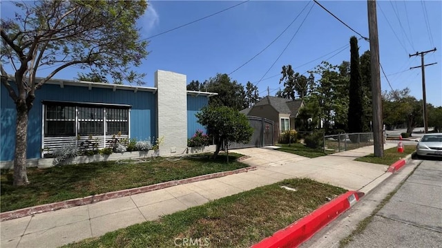 view of property exterior featuring a chimney