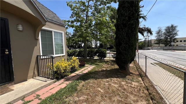 view of yard with fence