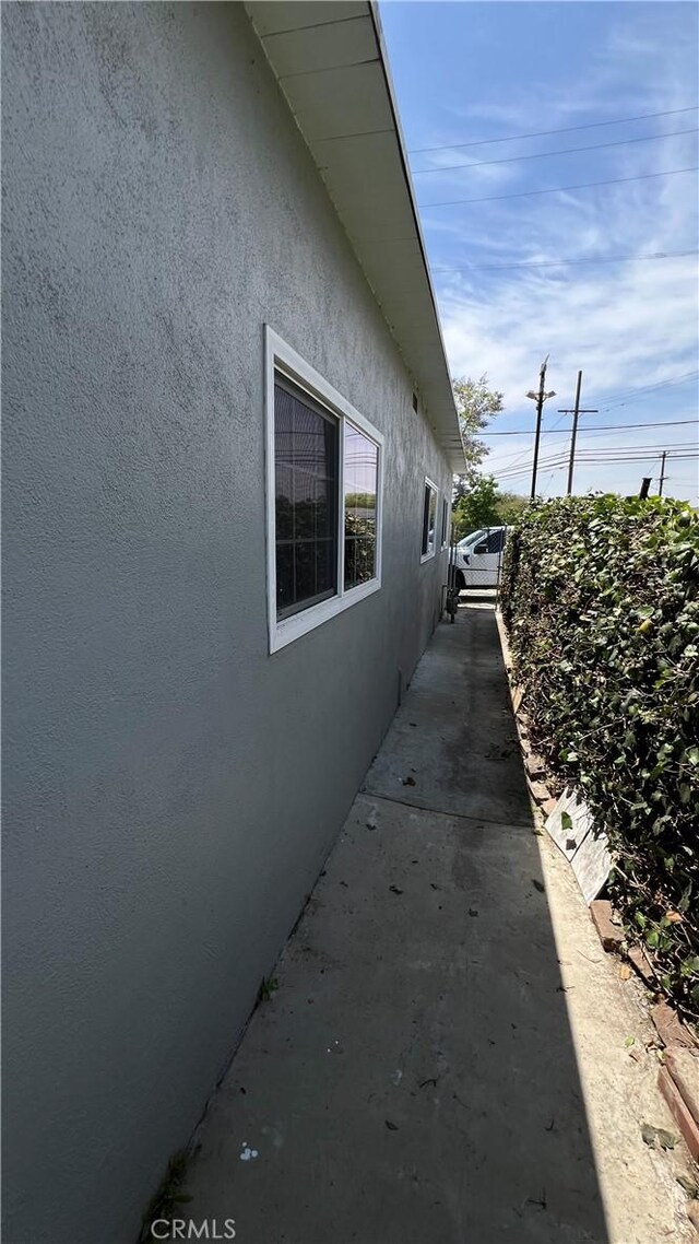 view of home's exterior with stucco siding