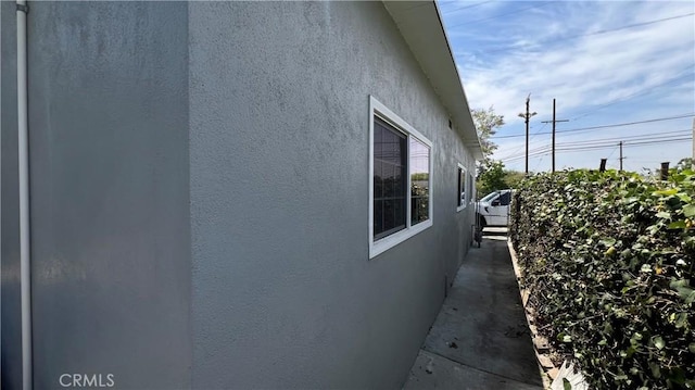view of home's exterior with stucco siding