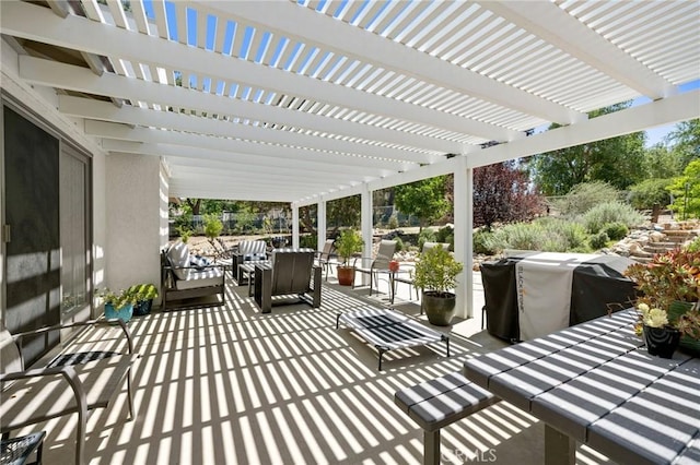 view of patio / terrace with a pergola, an outdoor living space, and area for grilling