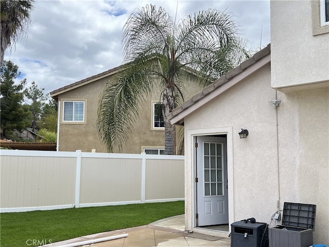 36613 Wandering Pl, Murrieta, CA 92563 - property entrance featuring fence and stucco siding