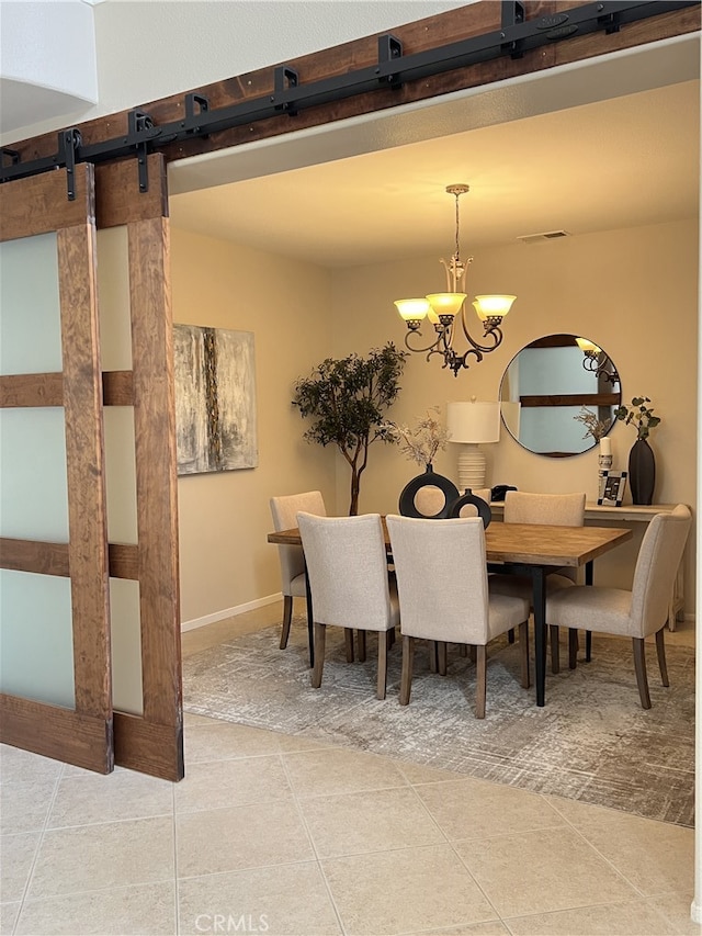 36613 Wandering Pl, Murrieta, CA 92563 - dining room featuring light tile patterned floors, a barn door, and a chandelier