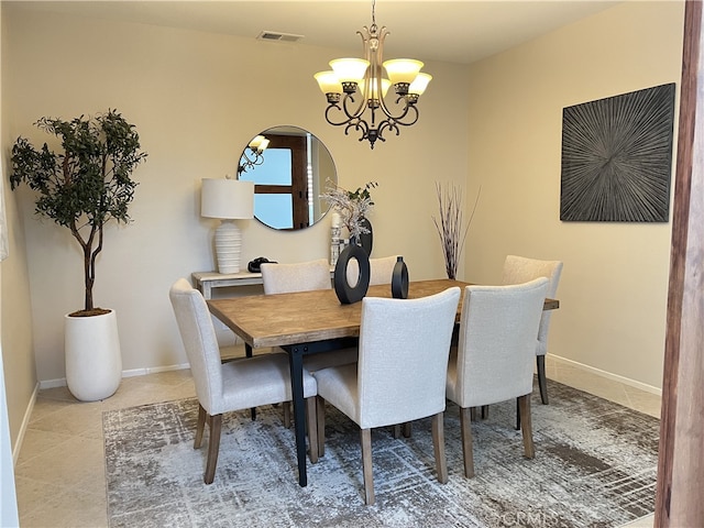 36613 Wandering Pl, Murrieta, CA 92563 - tiled dining room with a chandelier and baseboards