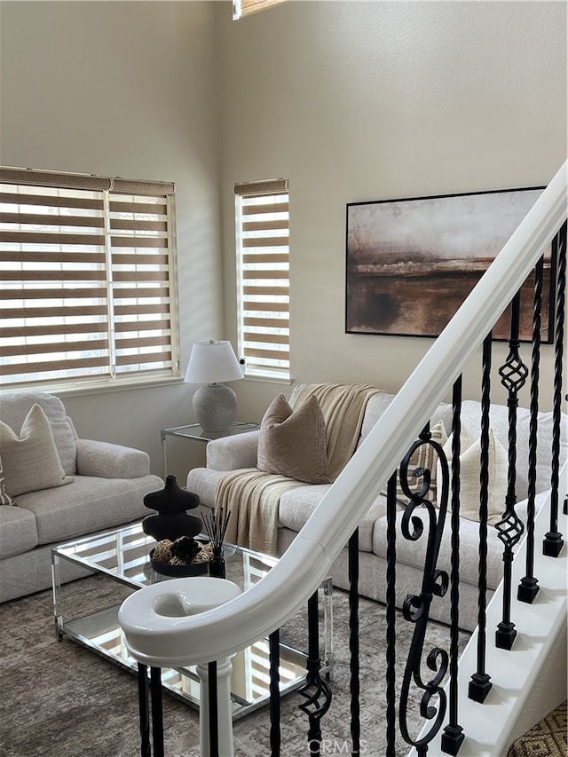 36613 Wandering Pl, Murrieta, CA 92563 - carpeted living room featuring stairway