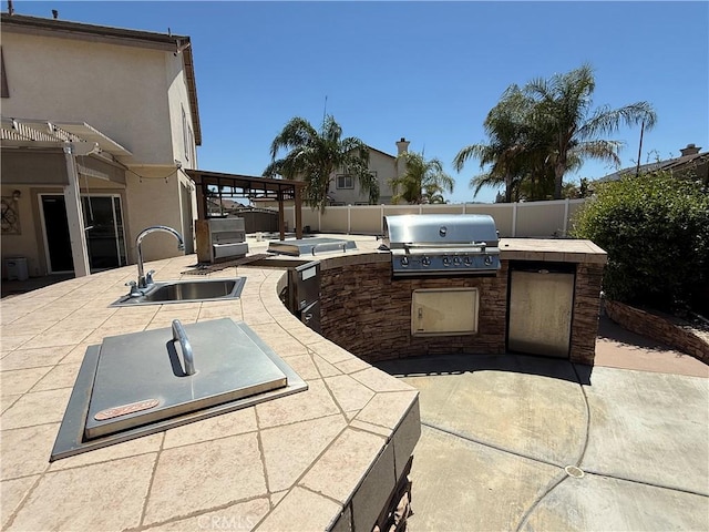 36613 Wandering Pl, Murrieta, CA 92563 - view of patio / terrace featuring a sink, grilling area, exterior kitchen, and a fenced backyard