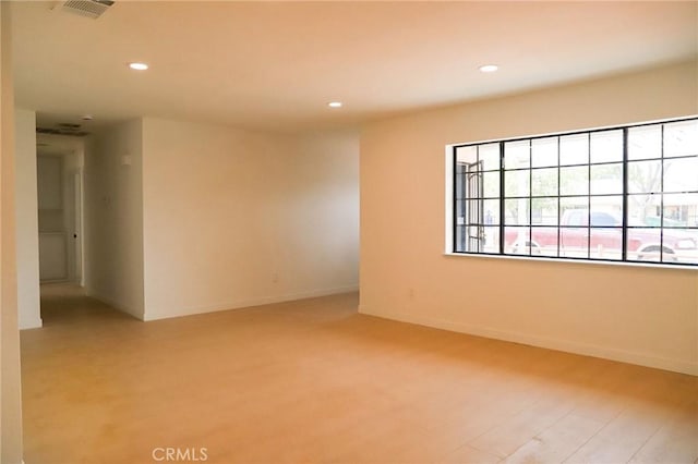 16109 Chuka Ave, Palmdale, CA 93591 - empty room with recessed lighting, light wood-style flooring, and baseboards