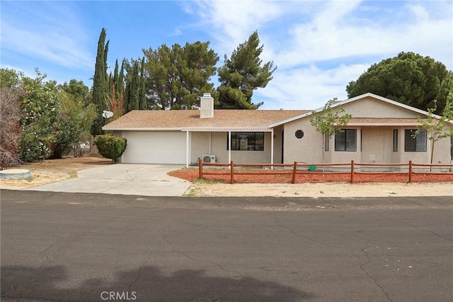 16109 Chuka Ave, Palmdale, CA 93591 - ranch-style home featuring a garage, a fenced front yard, a chimney, and driveway