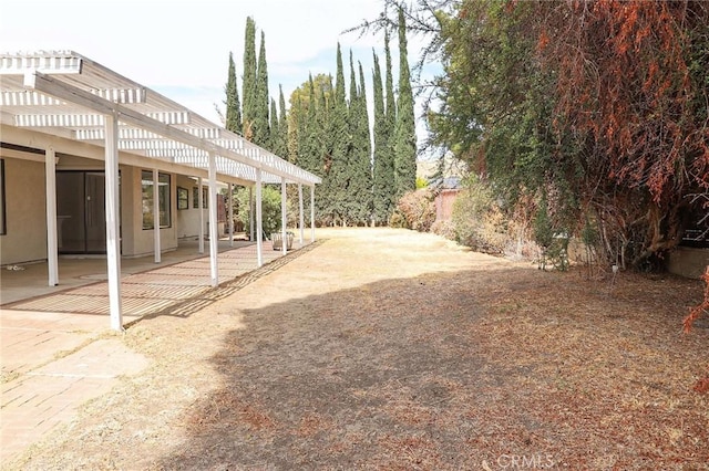 16109 Chuka Ave, Palmdale, CA 93591 - view of yard with a pergola and a patio area