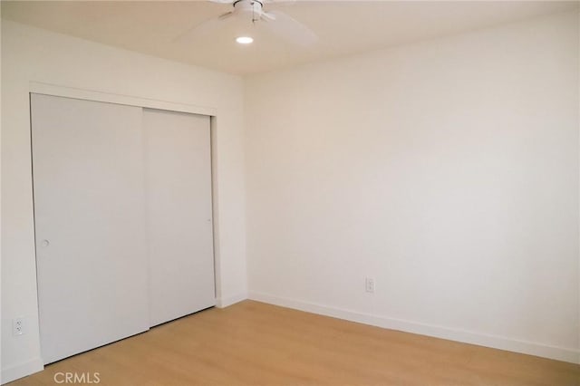 16109 Chuka Ave, Palmdale, CA 93591 - unfurnished bedroom with light wood-style flooring, a closet, baseboards, and recessed lighting