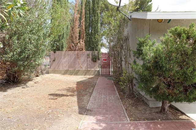 16109 Chuka Ave, Palmdale, CA 93591 - view of yard featuring fence and a gate
