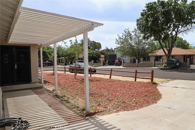 16109 Chuka Ave, Palmdale, CA 93591 - view of yard featuring a pergola and fence