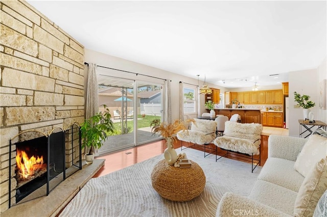18633 Gledhill St, Northridge, CA 91324 - living room with a large fireplace and light wood-style floors