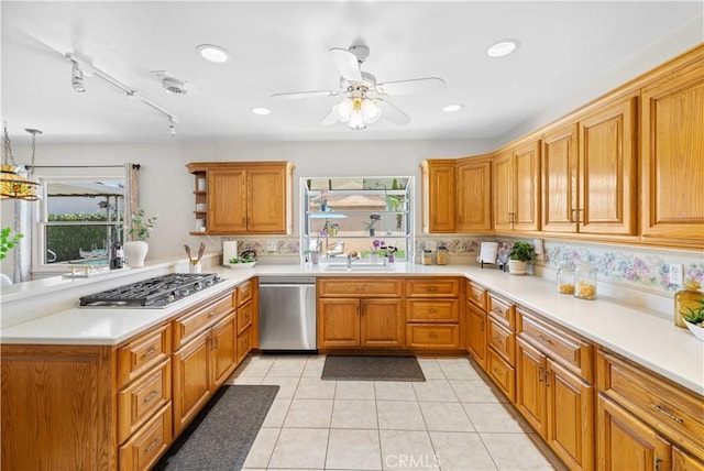 18633 Gledhill St, Northridge, CA 91324 - kitchen with appliances with stainless steel finishes, plenty of natural light, light countertops, and recessed lighting