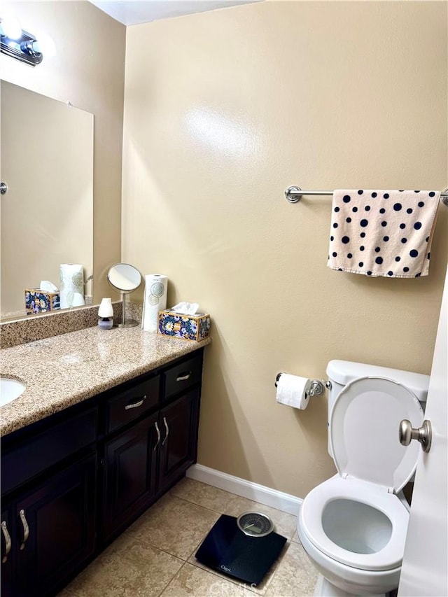 25453 Via Novia, Valencia, CA 91355 - half bath with vanity, tile patterned flooring, baseboards, and toilet