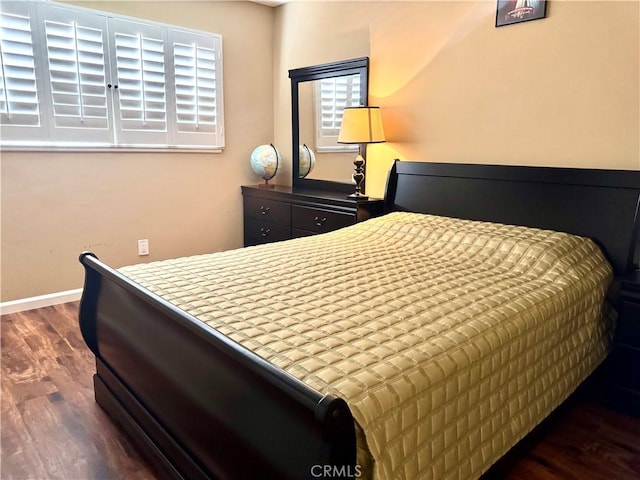 25453 Via Novia, Valencia, CA 91355 - bedroom featuring dark wood-type flooring and baseboards