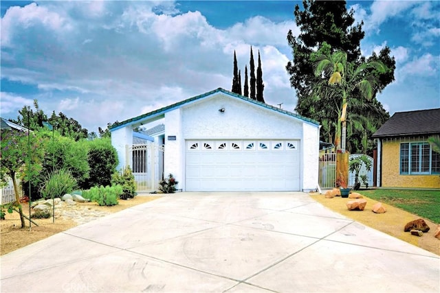 13142 Reedley St, Arleta, CA 91331 - ranch-style home with concrete driveway, stucco siding, and an attached garage
