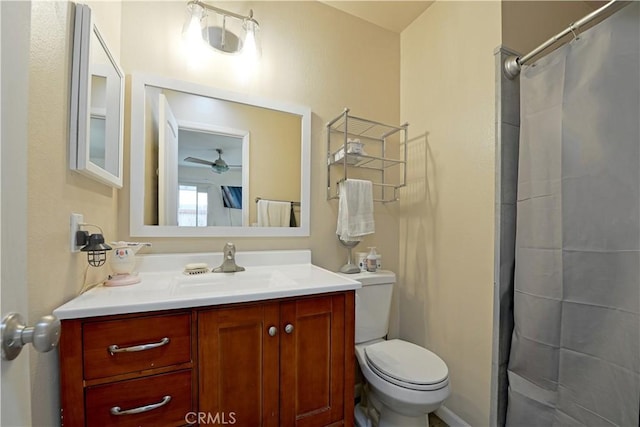 13142 Reedley St, Arleta, CA 91331 - bathroom featuring toilet, vanity, a shower with curtain, and ceiling fan
