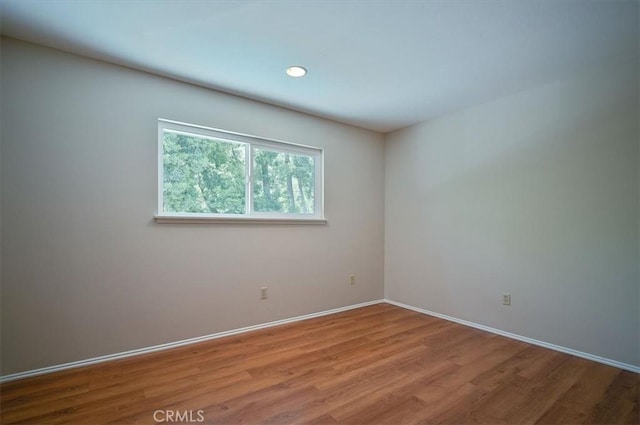 2521 Wildrose Ln, Upland, CA 91784 - unfurnished room with wood finished floors and recessed lighting