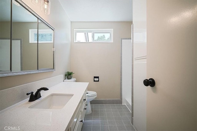 2521 Wildrose Ln, Upland, CA 91784 - bathroom featuring vanity, tile patterned floors, and a shower