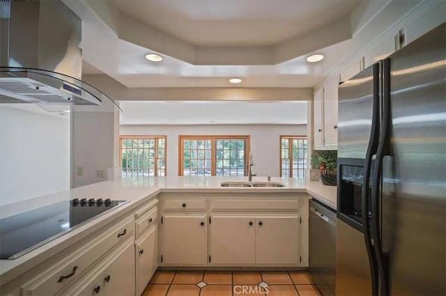 2521 Wildrose Ln, Upland, CA 91784 - kitchen with stainless steel appliances, island exhaust hood, recessed lighting, light countertops, and light tile patterned floors
