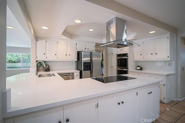 2521 Wildrose Ln, Upland, CA 91784 - kitchen featuring stainless steel appliances, island range hood, recessed lighting, white cabinetry, and a peninsula
