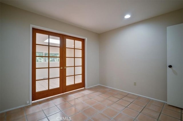 2521 Wildrose Ln, Upland, CA 91784 - unfurnished room with french doors, recessed lighting, and light tile patterned floors