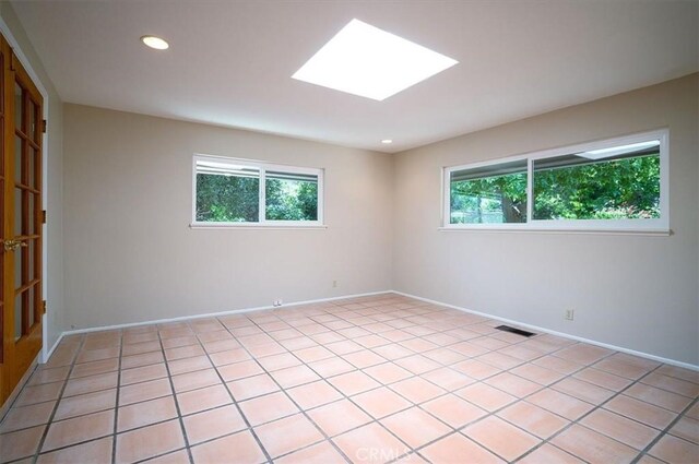 2521 Wildrose Ln, Upland, CA 91784 - unfurnished room featuring plenty of natural light, recessed lighting, and a skylight